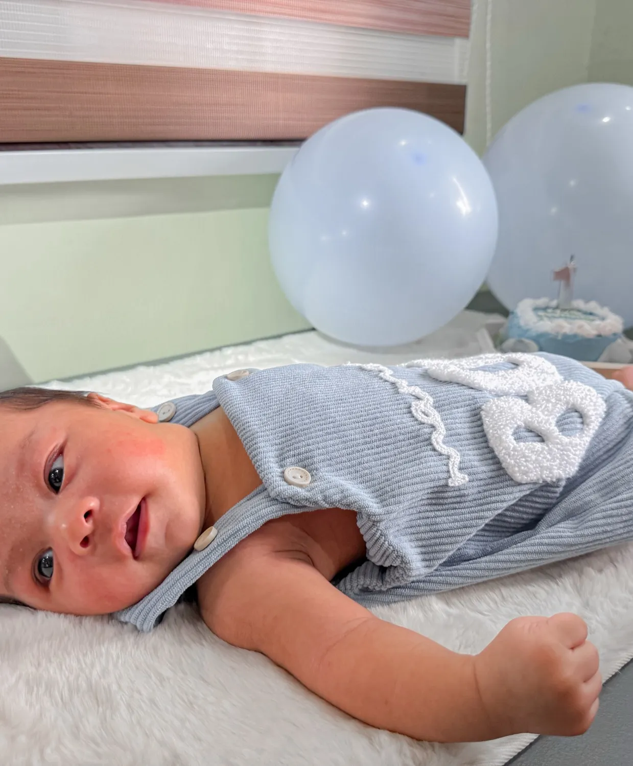 Baby Louis gazing at the camera